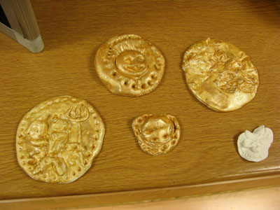 Some of the Roman coins made during the workshop!
